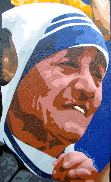 Mural art portrait painting of religious Catholic nun Mother Teresa of Calcutta with her hands together and smiling.